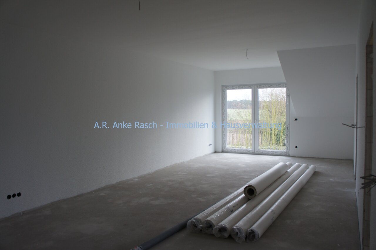 Modern im Grünen Wohnen, Neubau in Hassel - 3-Zimmer mit Gartenanteil