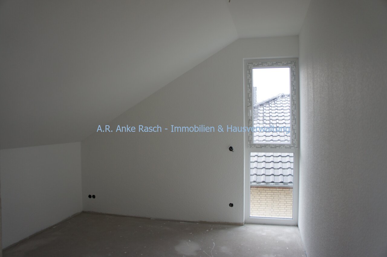 Modern im Grünen Wohnen, Neubau in Hassel - 3-Zimmer mit Gartenanteil