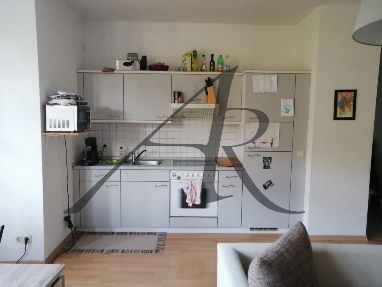 Wohnzimmer/Küche mit Einbauküche