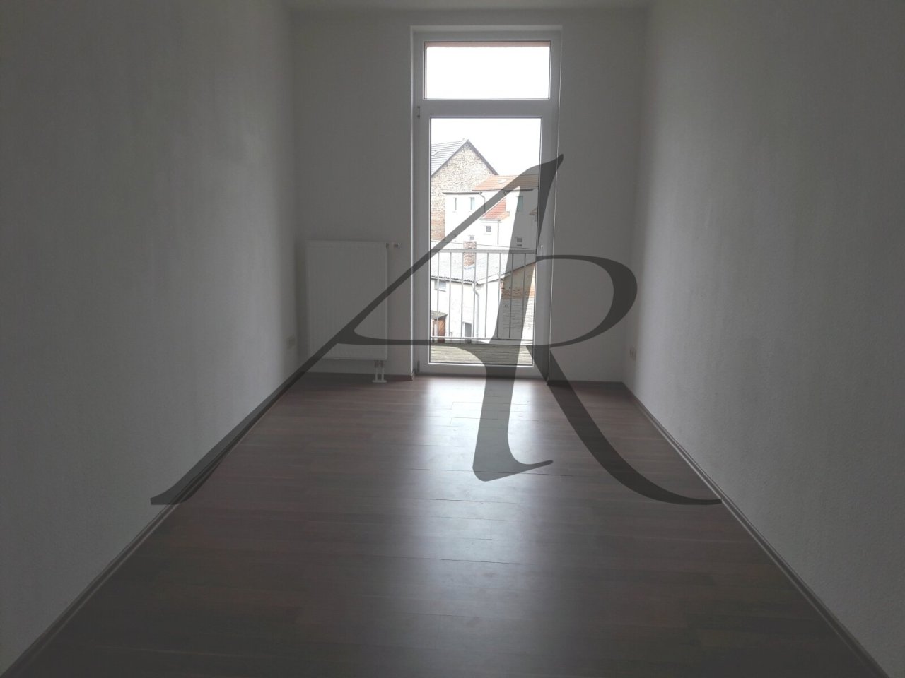 Wohnzimmer mit Balkon